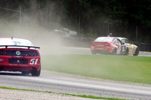 Al Carter / Hugh Plumb BMW M3 Coupe, Dan Rogers / Seth Thomas BMW 328i and Joey Atterbury / Tim Bell Ford Mustang Boss 302R GT