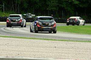 Bryan Heitkotter / B.J. Zacharias Nissan 370Z and Mat Pombo / Mark Pombo and Taylor Hacquard / Kenton Koch Mazda Speed 3s