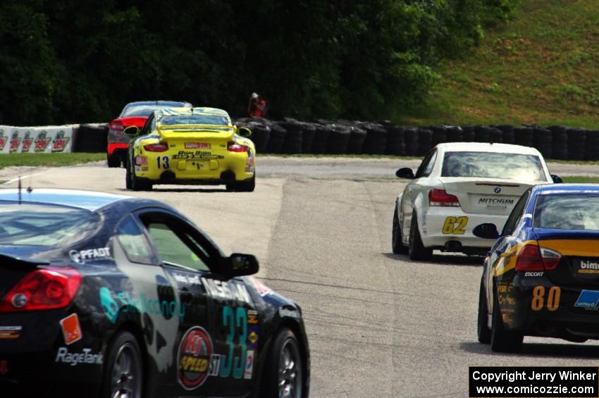 The field keeps its tires warm during a yellow flag