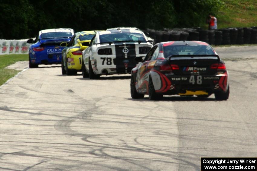 GS cars head into turn 7