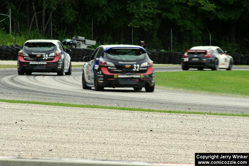 Bryan Heitkotter / B.J. Zacharias Nissan 370Z and Mat Pombo / Mark Pombo and Taylor Hacquard / Kenton Koch Mazda Speed 3s