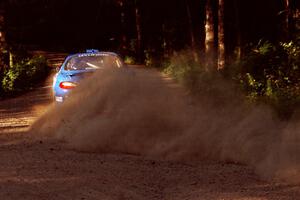 Noel Lawler / Charles Bradley Hyundai Tiburon powers out of a 90-right on SS1, Akeley Cutoff.