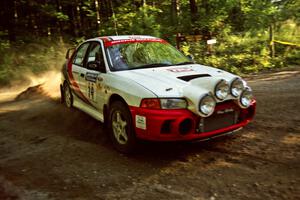 Garen Shrader / Doc Schrader Mitsubishi Lancer Evo IV at a 90-right on SS1, Akeley Cutoff.