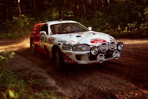 Ralph Kosmides / Joe Noyes Toyota Supra Turbo at a 90-right on SS1, Akeley Cutoff.