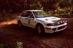 Tony Takaori / Ken Cassidy Mitsubishi Lancer Evo III at a 90-right on SS1, Akeley Cutoff.