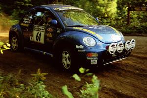 Karl Scheible / Gail McGuire VW Beetle at a 90-right on SS1, Akeley Cutoff.