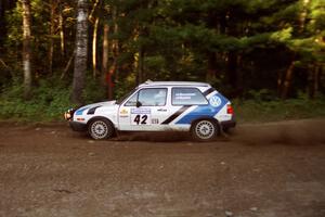 Eric Burmeister / Mark Buskirk VW GTI at speed on SS1, Akeley Cutoff.