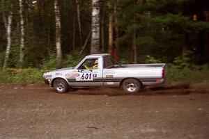 Mike Halley / Emily Burton-Weinman Dodge Ram 50 at speed on SS1, Akeley Cutoff.