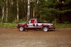 Scott Carlborn / Jim Konkler Jeep Comanche at speed on SS1, Akeley Cutoff.