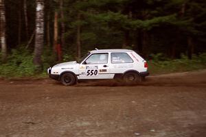 Aaron Hatz / Brendan Higgins VW GTI at speed on SS1, Akeley Cutoff.