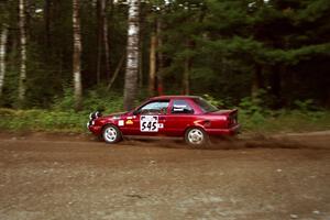 Eric Seppanen / Chris Somero Nissan Sentra SE-R at speed on SS1, Akeley Cutoff.