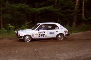 John Zoerner / Greg Reno Dodge Omni GLH-Turbo at speed on SS1, Akeley Cutoff.