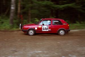 Mike Magozzi / Dave Fuss VW Golf at speed on SS1, Akeley Cutoff.