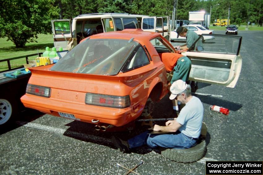 Andrew Havas / Scott Slingerland Mazda RX-7 is stickered up and prepped prior to the start.