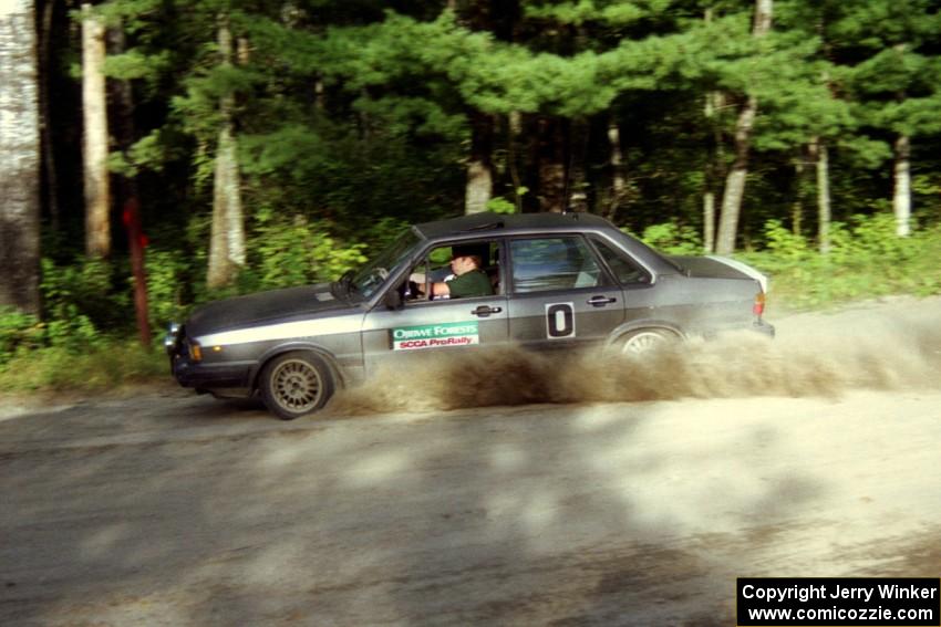 Brad Odegard's Audi 4000 Quattro ran '0' car, shown here at a 90-right on SS1, Akeley Cutoff.