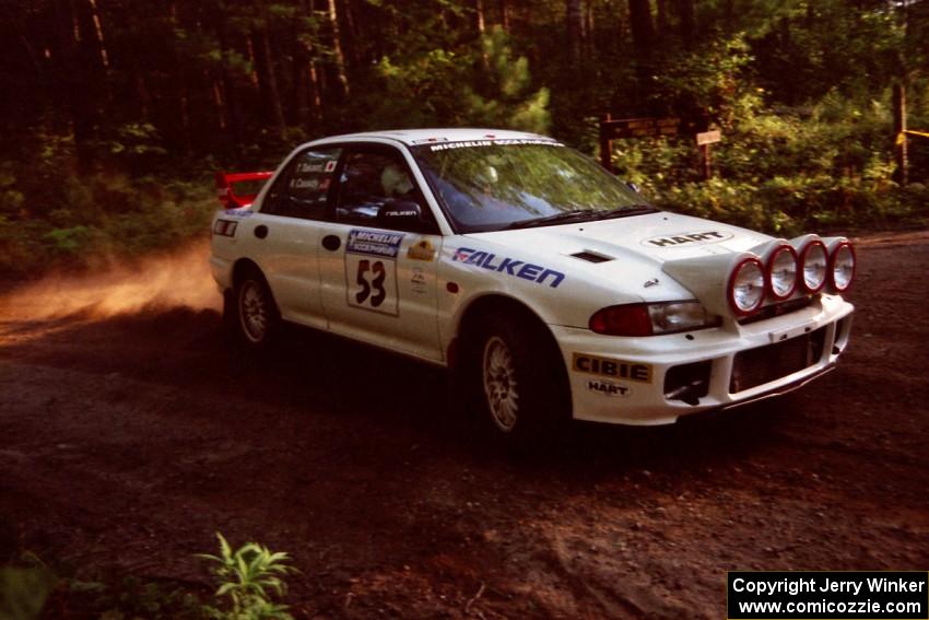 Tony Takaori / Ken Cassidy Mitsubishi Lancer Evo III at a 90-right on SS1, Akeley Cutoff.