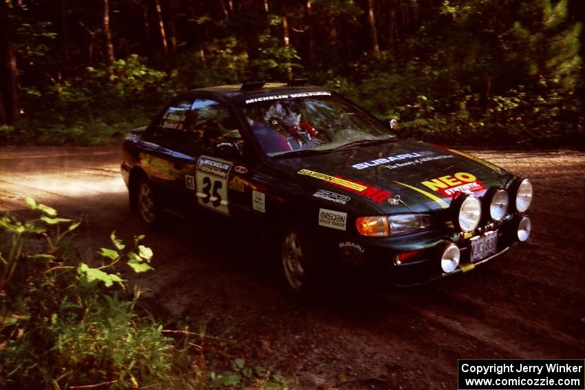 Lee Shadbolt / Claire Chizma Subaru Impreza at a 90-right on SS1, Akeley Cutoff.