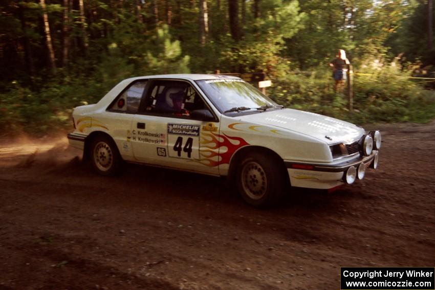 Henry Krolikowski / Cindy Krolikowski Dodge Shadow at a 90-right on SS1, Akeley Cutoff.