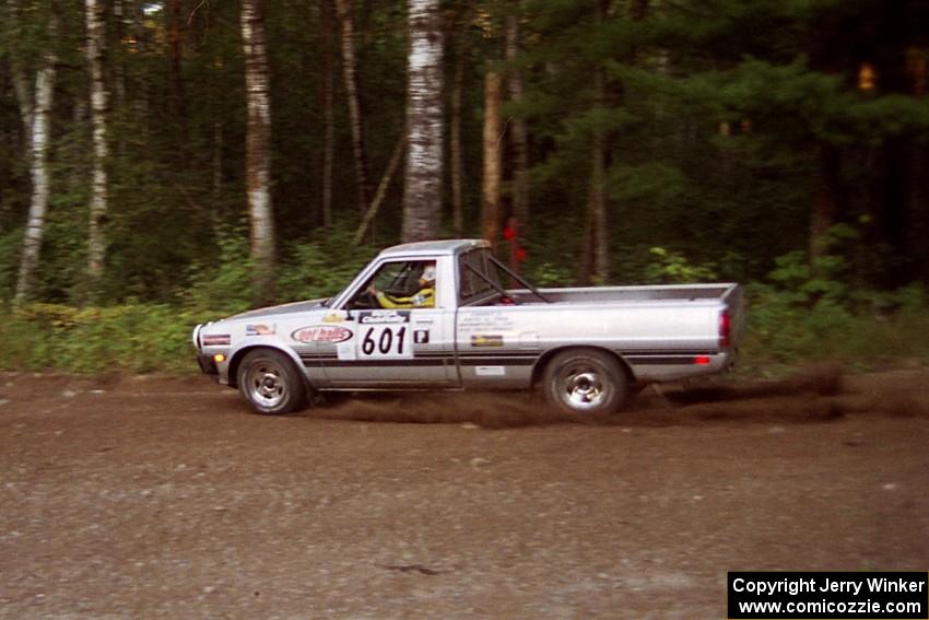 Mike Halley / Emily Burton-Weinman Dodge Ram 50 at speed on SS1, Akeley Cutoff.