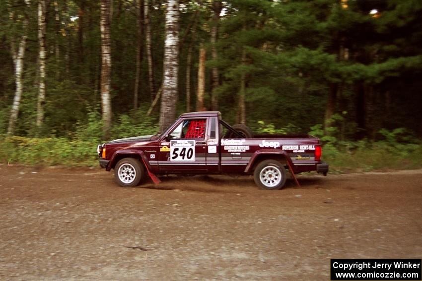 Scott Carlborn / Jim Konkler Jeep Comanche at speed on SS1, Akeley Cutoff.