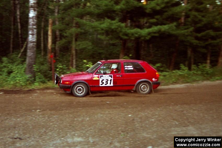 J.B. Niday / J.B. Lewis VW GTI at speed on SS1, Akeley Cutoff.