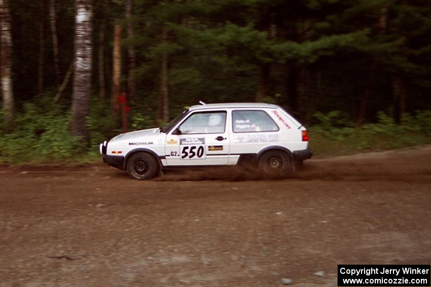 Aaron Hatz / Brendan Higgins VW GTI at speed on SS1, Akeley Cutoff.