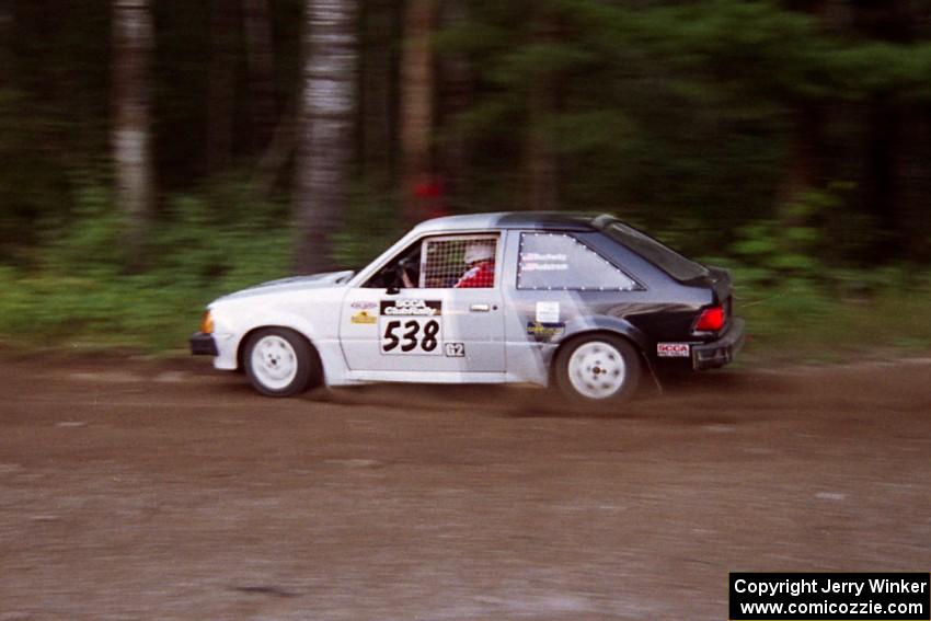 Jim Buchwitz / C.O. Rudstrom Ford Escort at speed on SS1, Akeley Cutoff.