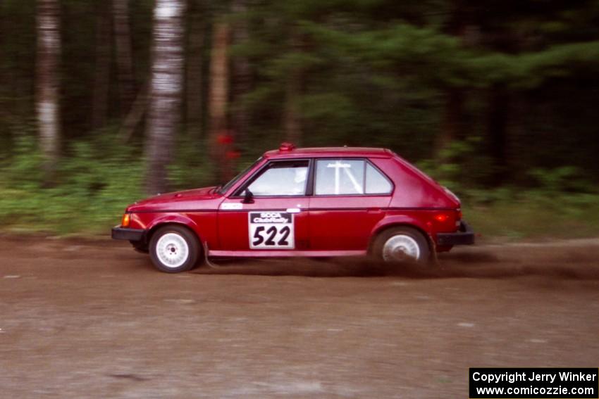 Jon Butts / Ashley Cox Dodge Omni at speed on SS1, Akeley Cutoff.