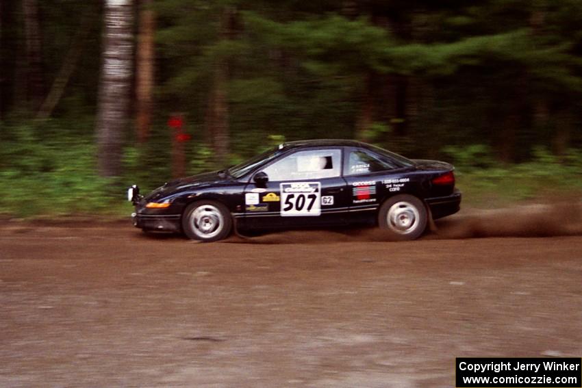 Micah Wiitala / Josh Prusi Saturn SC2 at speed on SS1, Akeley Cutoff.