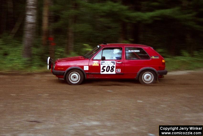 Mike Magozzi / Dave Fuss VW Golf at speed on SS1, Akeley Cutoff.