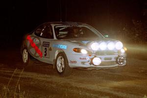 Paul Choiniere / Jeff Becker Hyundai Tiburon at speed through the crossroads on SS6, East Steamboat.