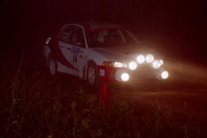 Garen Shrader / Doc Schrader Mitsubishi Lancer Evo IV at speed through the crossroads on SS6, East Steamboat.