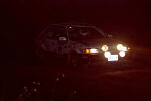 Lauchlin O'Sullivan / John Dillon Mazda 323GTX at speed through the crossroads on SS6, East Steamboat.