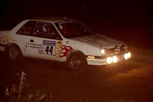 Henry Krolikowski / Cindy Krolikowski Dodge Shadow at speed through the crossroads on SS6, East Steamboat.