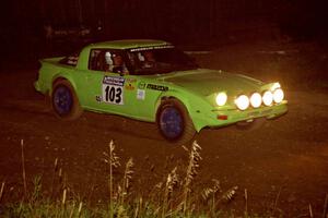 Jim Dale / Bob Logue Mazda RX-7 at speed through the crossroads on SS6, East Steamboat.