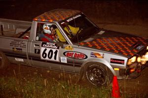 Mike Halley / Emily Burton-Weinman Dodge Ram 50 at speed through the crossroads on SS6, East Steamboat.