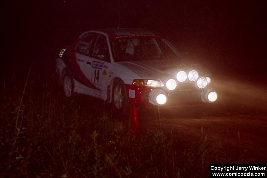 Garen Shrader / Doc Schrader Mitsubishi Lancer Evo IV at speed through the crossroads on SS6, East Steamboat.