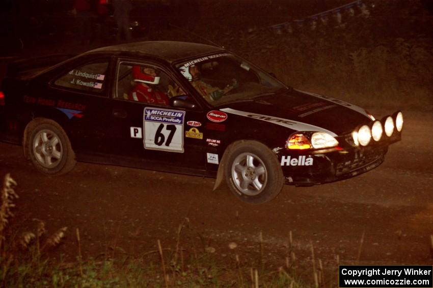 Jay Kowalik / Carl Lindquist Honda Civic CVT at speed through the crossroads on SS6, East Steamboat.