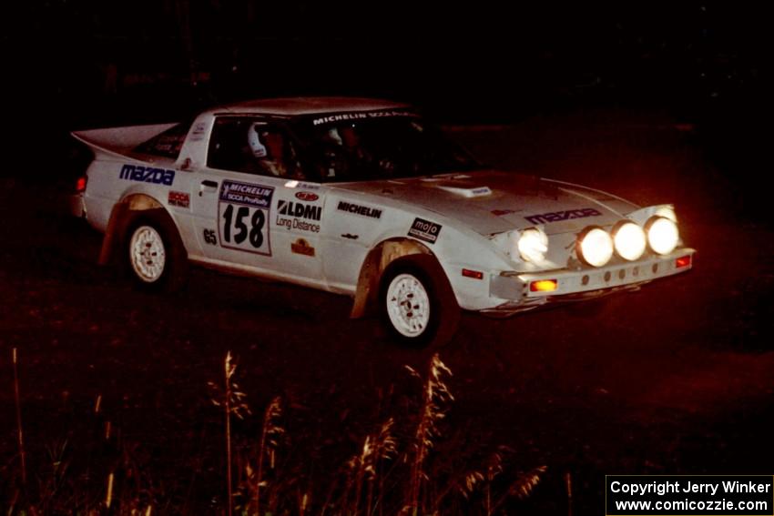 Ted Grzelak / Chris Plante Mazda RX-7 at speed through the crossroads on SS6, East Steamboat.