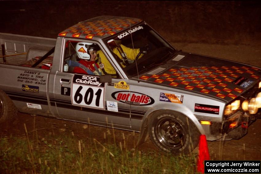 Mike Halley / Emily Burton-Weinman Dodge Ram 50 at speed through the crossroads on SS6, East Steamboat.