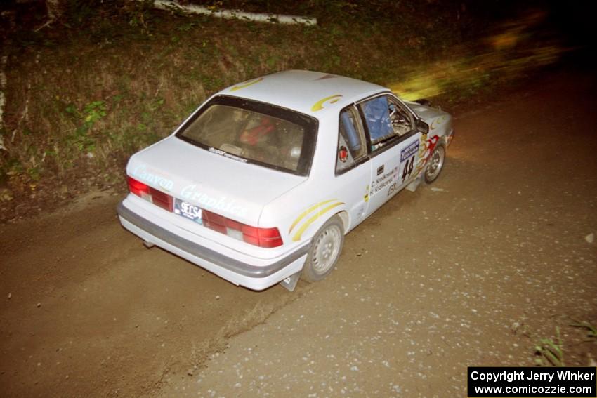 Henry Krolikowski / Cindy Krolikowski Dodge Shadow at speed on SS8, Kabekona.