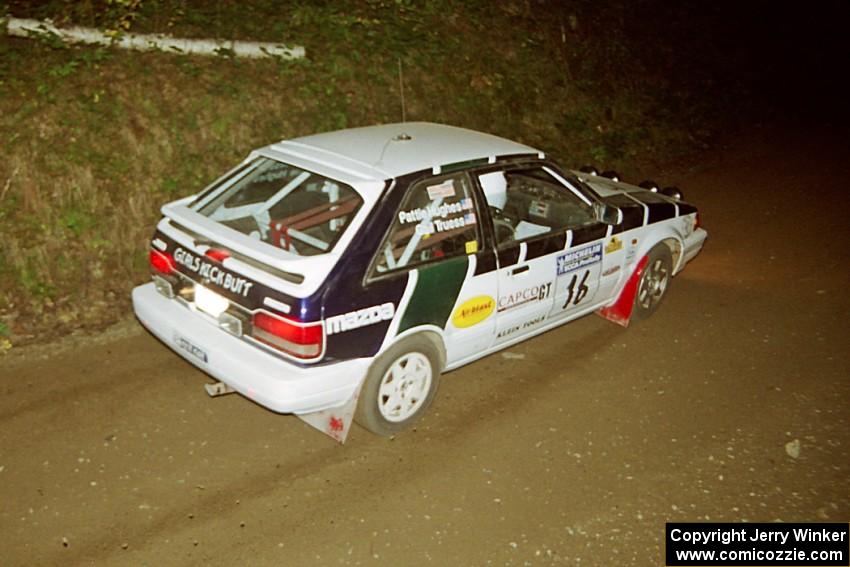 Gail Truess / Pattie Hughes Mazda 323GTX at speed on SS8, Kabekona.