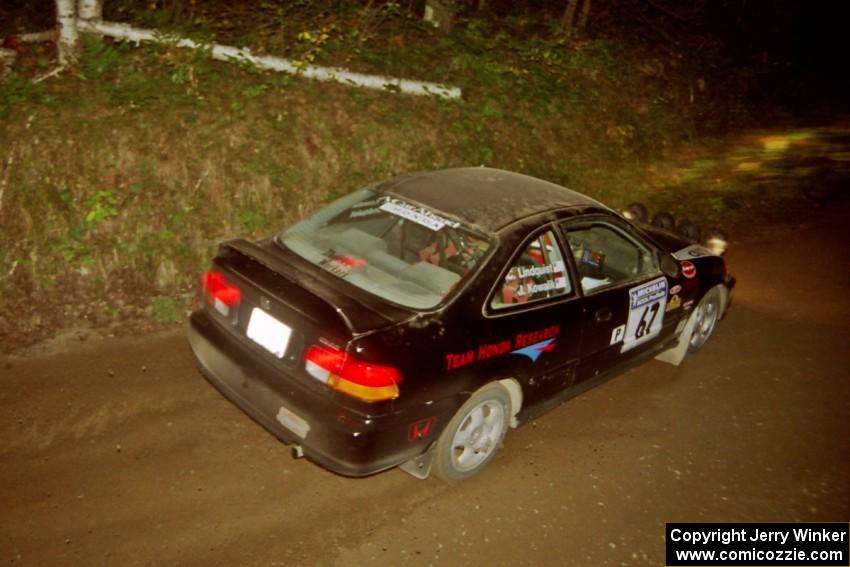 Jay Kowalik / Carl Lindquist Honda Civic CVT at speed on SS8, Kabekona.