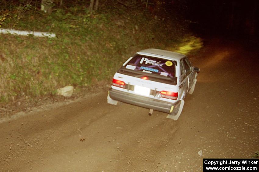 Lauchlin O'Sullivan / John Dillon Mazda 323GTX at speed on SS8, Kabekona.