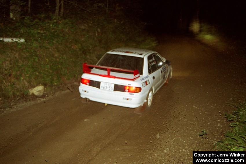 Tony Takaori / Ken Cassidy Mitsubishi Lancer Evo III at speed on SS8, Kabekona.