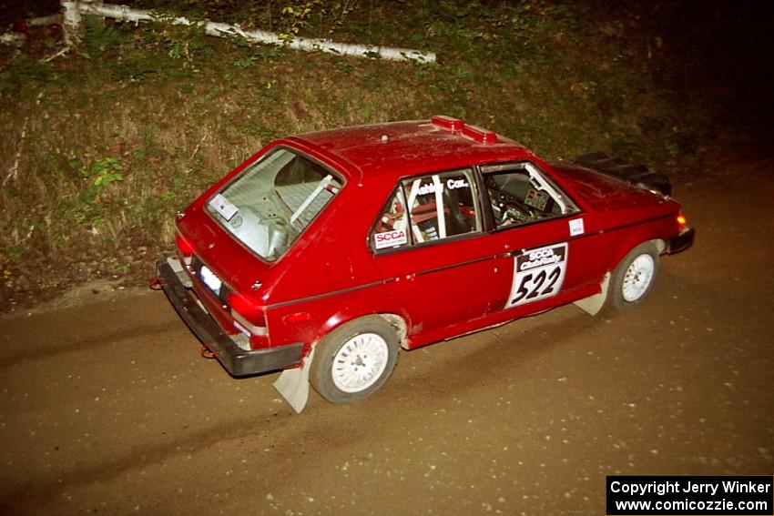 Jon Butts / Ashley Cox Dodge Omni at speed on SS8, Kabekona.