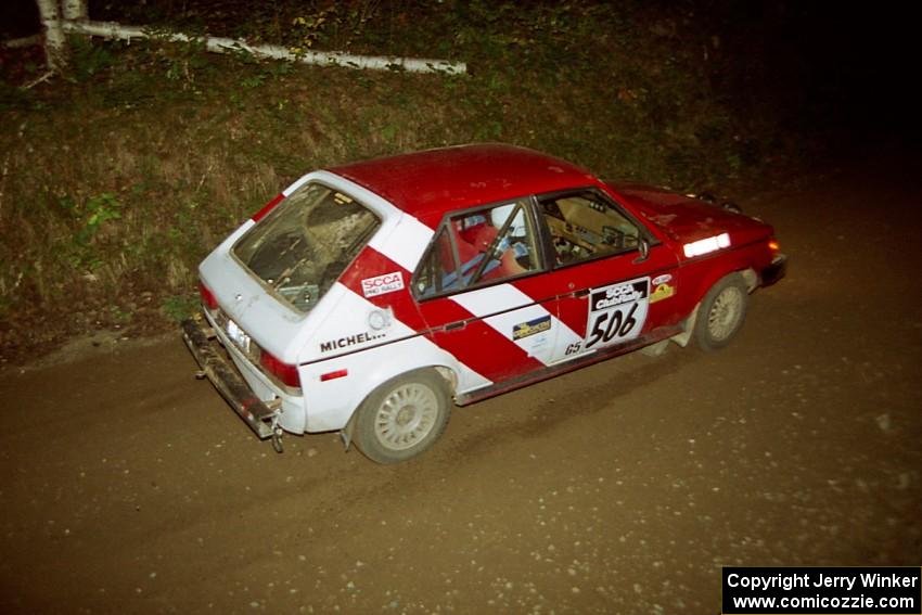 Erik Payeur / Adam Payeur Dodge Omni at speed on SS8, Kabekona.