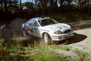 Noel Lawler / Charles Bradley Hyundai Tiburon powers out of a corner on SS11, Anchor Hill.