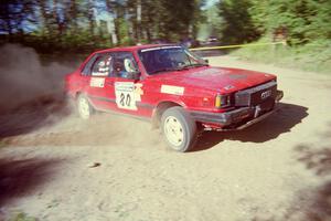 Jon Kemp / Rod Hendricksen Audi 4000 Quattro powers out of a corner on SS11, Anchor Hill.