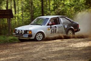 Jim Buchwitz / C.O. Rudstrom Ford Escort at speed on SS11, Anchor Hill.